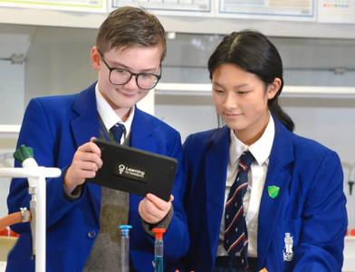 two pupils using LbQ secondary science